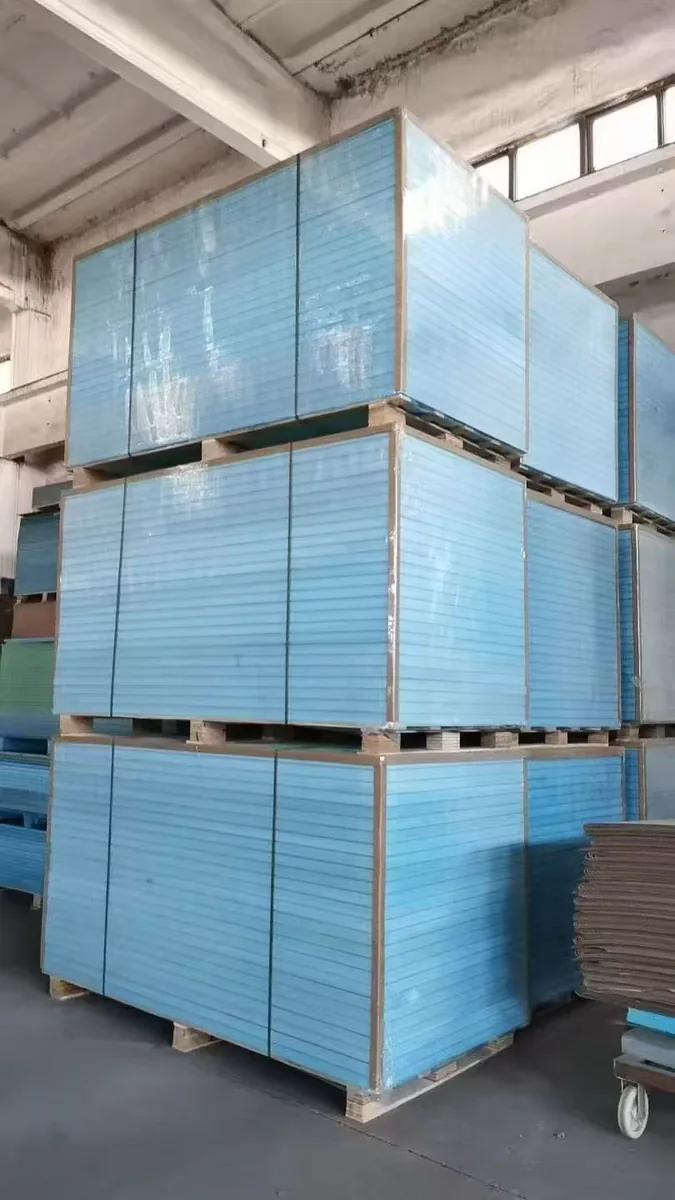 Blue insulation panel bundles strapped for warehouse storage